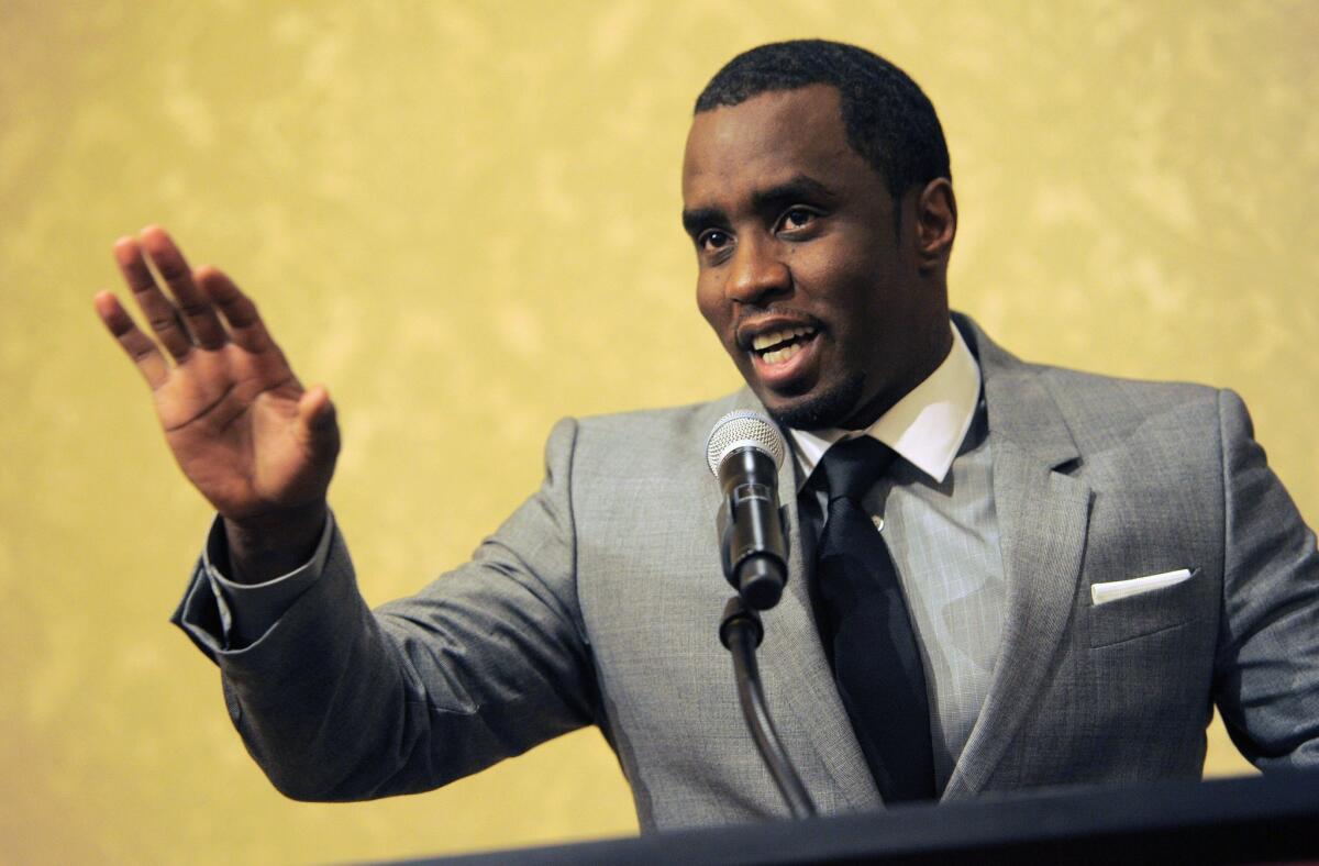Sean "Diddy" Combs appearing in 2013 at the Beverly Hilton Hotel in Beverly Hills. On Wednesday, the Los Angeles City Attorney's office said Combs must attend a hearing to determine whether he should face charges for an alleged confrontation in June at UCLA.