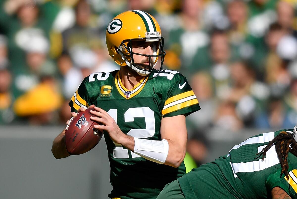 Green Bay Packers quarterback Aaron Rodgers looks to pass the ball against the Oakland Raiders on Oct. 20.