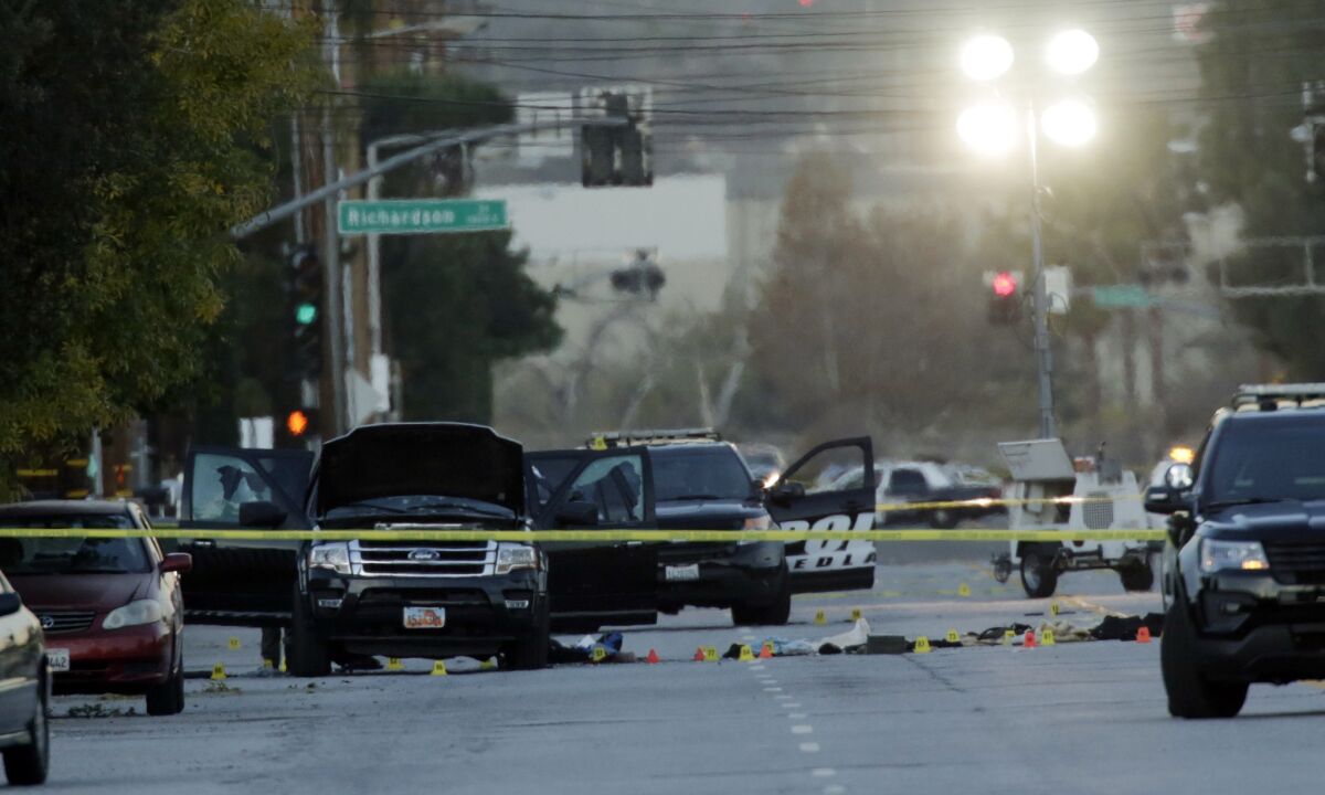 The investigation continues Thursday morning on San Bernardino Avenue, where two suspects in the mass shooting at the Inland Regional Center died in a shootout with police.