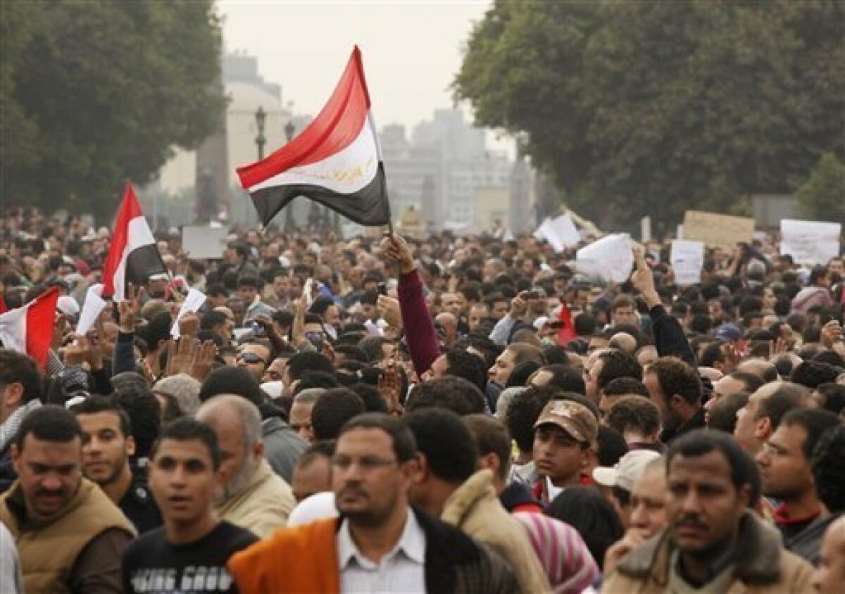 The crowd arrives in Tahrir, or Liberation, Square in Cairo, Egypt, Tuesday, Feb. 1, 2011. More than a quarter-million people flooded into the heart of Cairo Tuesday, filling the city's main square in by far the largest demonstration in a week of unceasing demands for President Hosni Mubarak to leave after nearly 30 years in power. (AP Photo/Victoria Hazou)