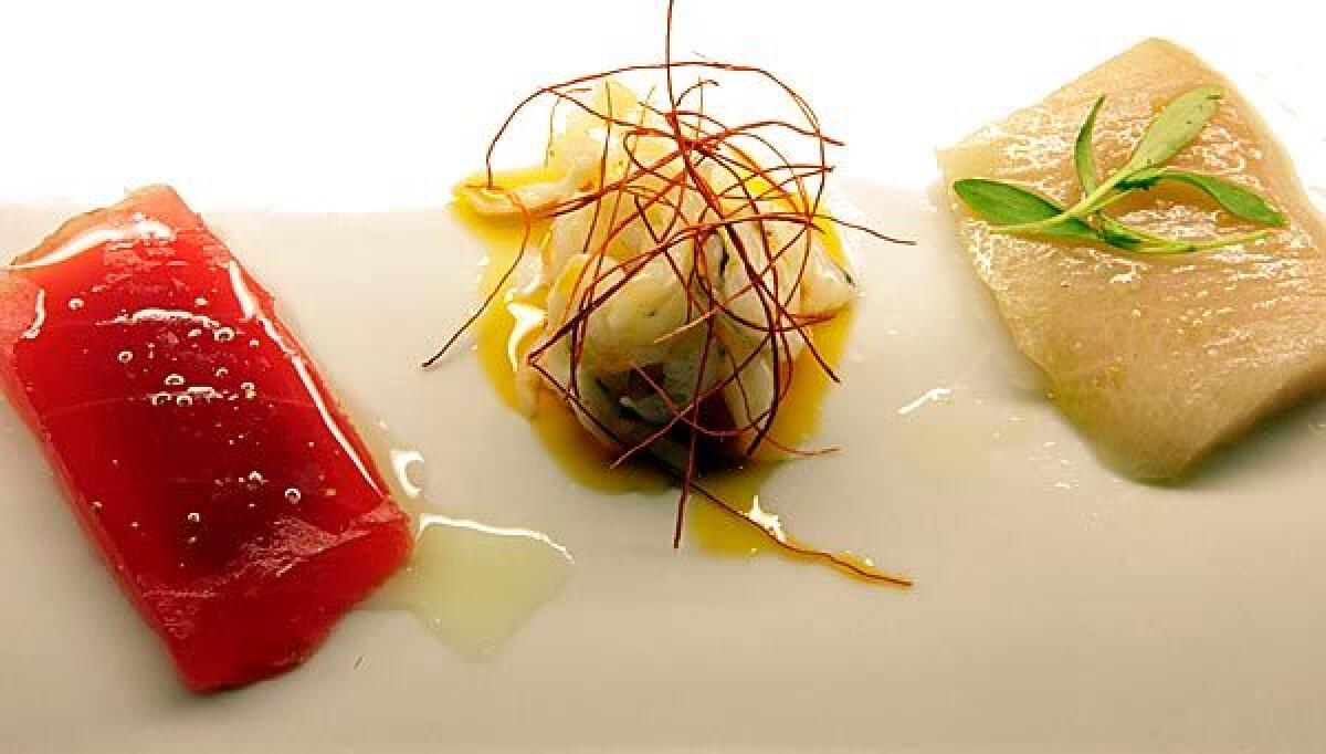 A crudo plate, as garnished by the chef.