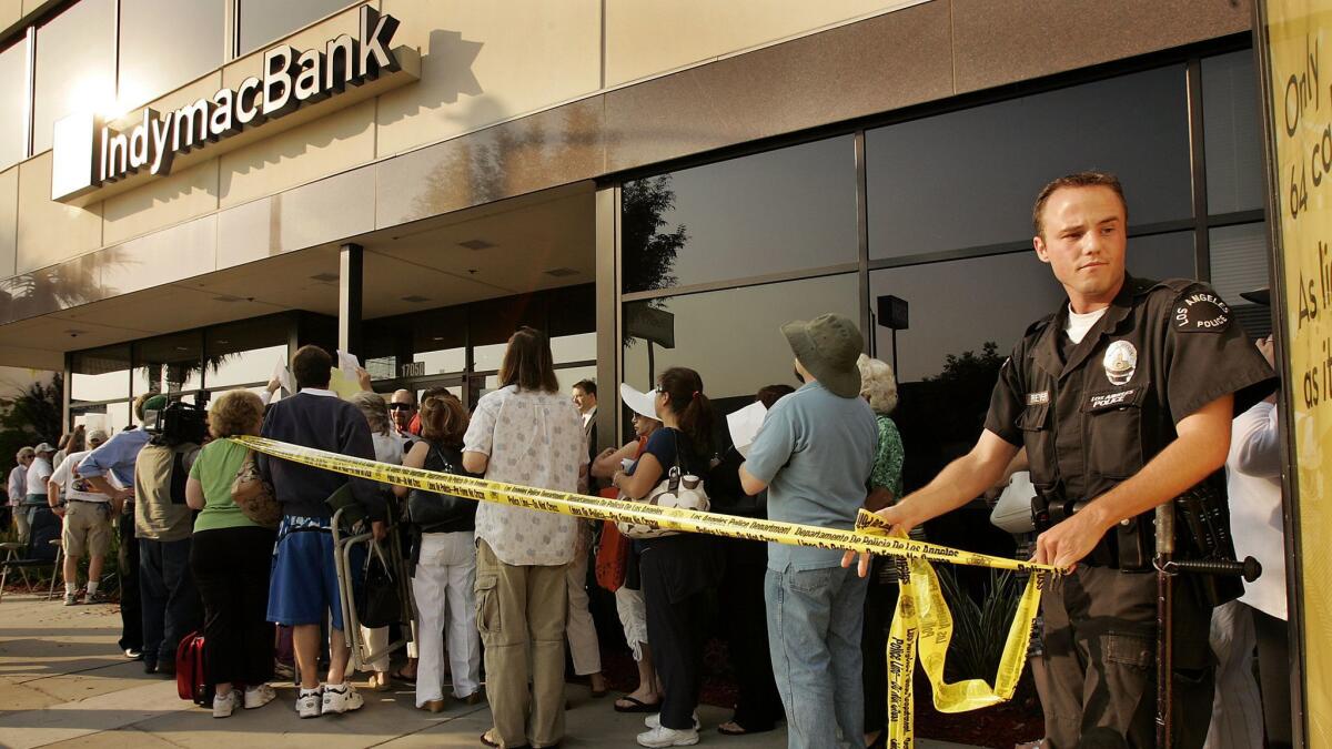 Panicked customers line up to enter an IndyMac branch in Encino to withdraw their money after the bank was seized by federal regulators in July 2008.
