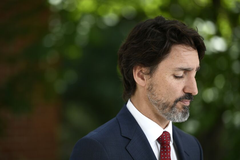 Prime Minister Justin Trudeau speaks during a news conference on the COVID-19 pandemic outside his residence at Rideau Cottage in Ottawa, Thursday, June 18, 2020. (Justin Tang/The Canadian Press via AP)