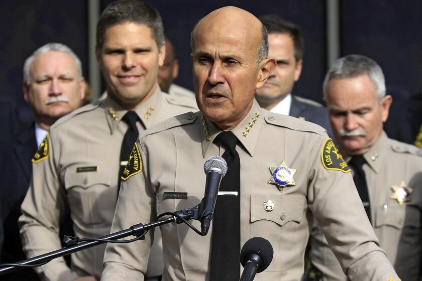 Lee Baca announces his retirement as Los Angeles County sheriff in January 2014. He pleaded guilty Wednesday to making a false statement.