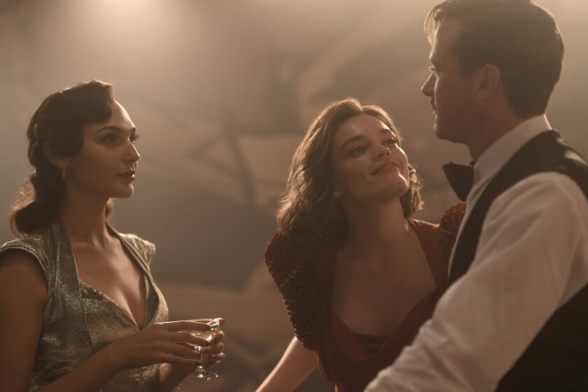 Gal Gadot, Emma Mackey and Armie Hammer in the Agatha Christie adaptation "Death on the Nile."