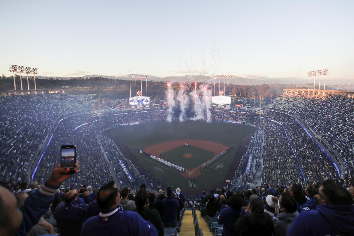 Fireworks fly in the outfield of Dodger Stadium before the 2023 season opener.
