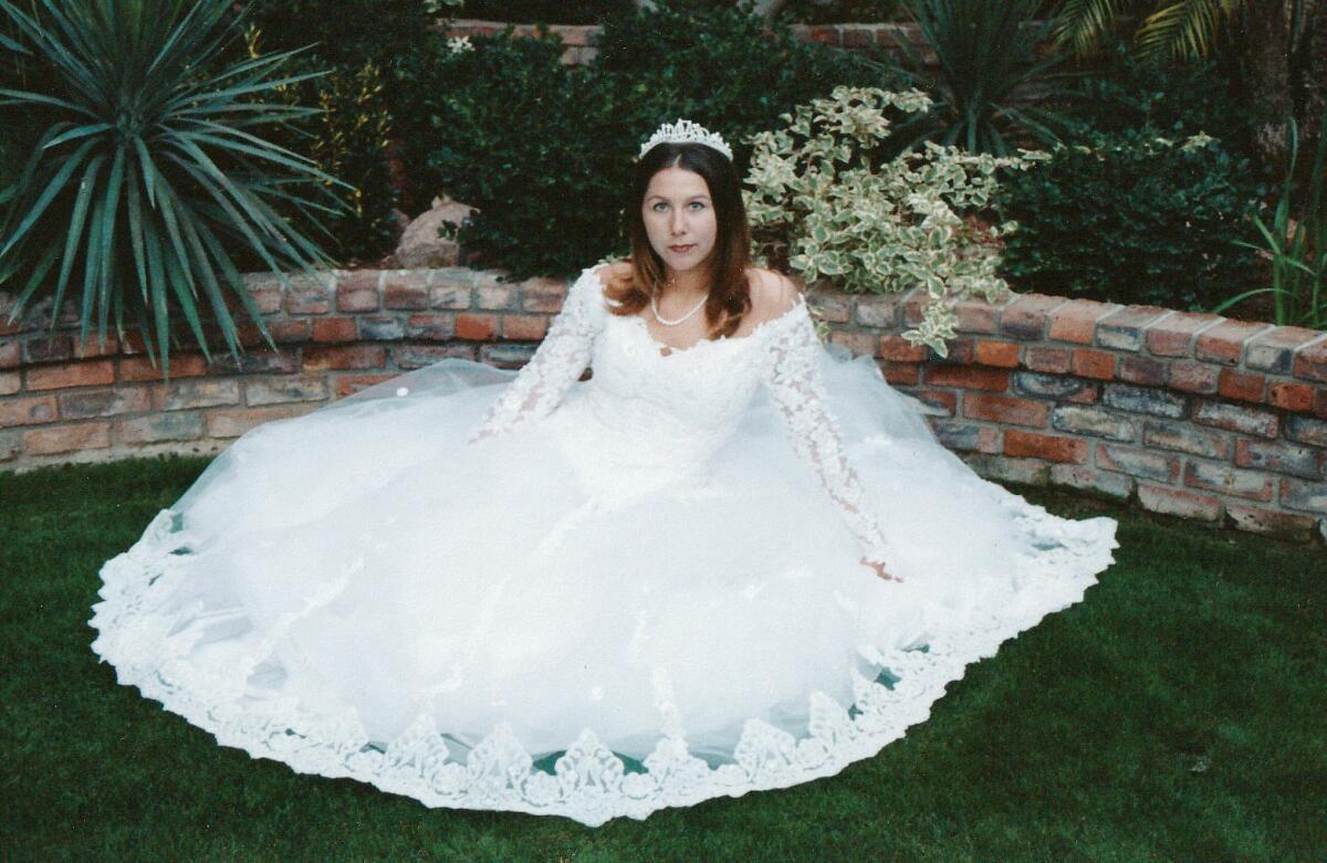 A photo of Mandy Havlik in a white wedding dress when she was 17-years-old.