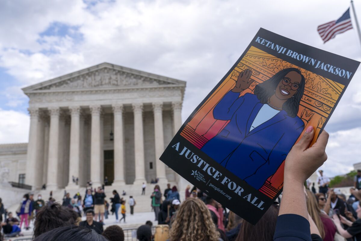 People celebrate the confirmation of Judge Ketanji Brown Jackson the first Black woman to reach the Supreme Court during a rally outside of the U.S. Supreme Court on Capitol Hill, in Washington, Friday, April 8, 2022. ( AP Photo/Jose Luis Magana)