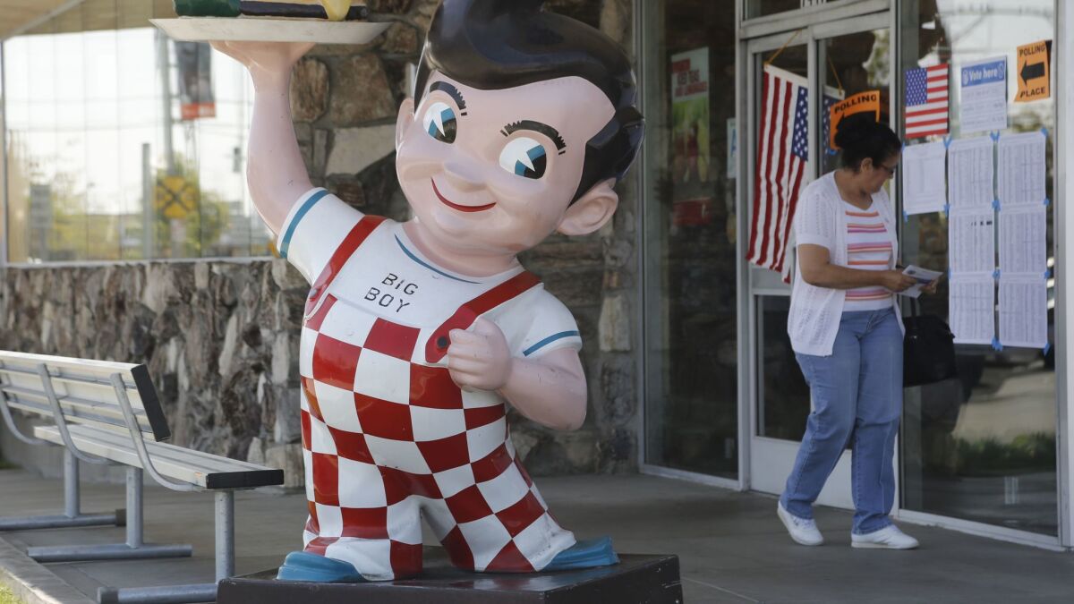 A voter outside Bob's Big Boy, a polling place for the  last presidential primary in California, in June 2016. 