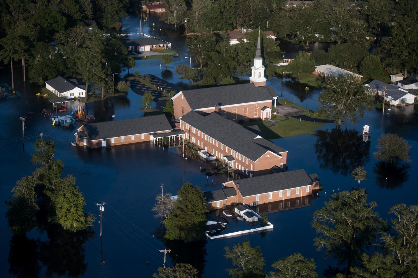 A church is surrounded by floodwaters from Hurricane Florence in Conway, S.C.