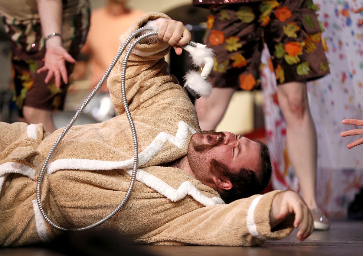 Cast member Chris Fine rehearses his part for "Drought" in the Laguna Beach community parody show Lagunatics.