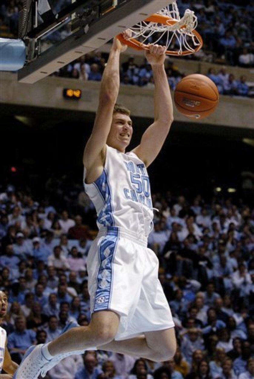 In this Dec. 19, 2007, file photo, North Carolina's Tyler Hansbrough dunks during the second half of North Carolina's NCAA college basketball game against Nicholls State in Chapel Hill, N.C. Hansbrough is out of practice indefinitely with a stress reaction condition in his right shin. Hansbrough did not practice Thursday, Oct. 30. Instead, he underwent an MRI that revealed the stress reaction, which if not properly treated could lead to a stress fracture, team spokesman Steve Kirschner said. (AP Photo/Sara D. Davis, File)
