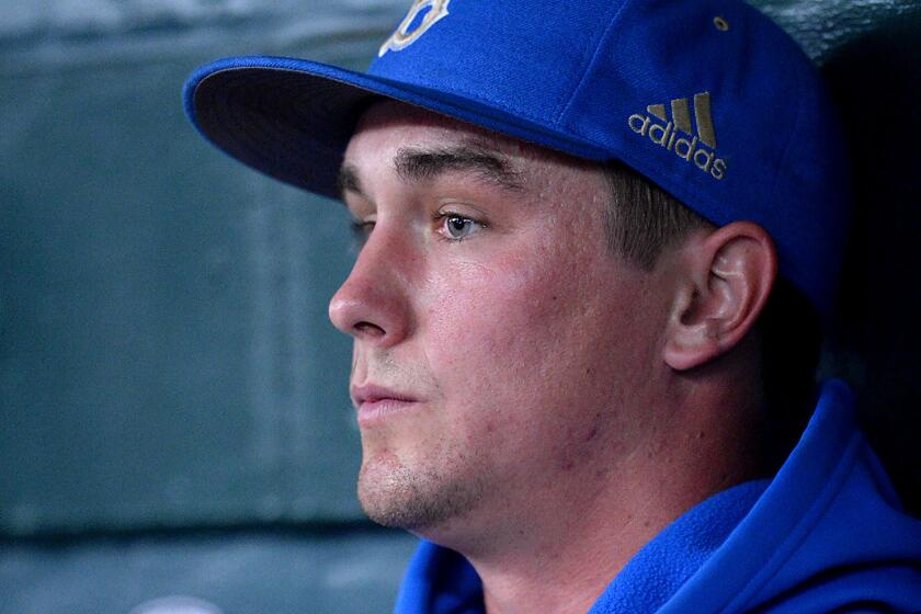 David Berg sits in the UCLA dugout during a 2015 game against Maryland 