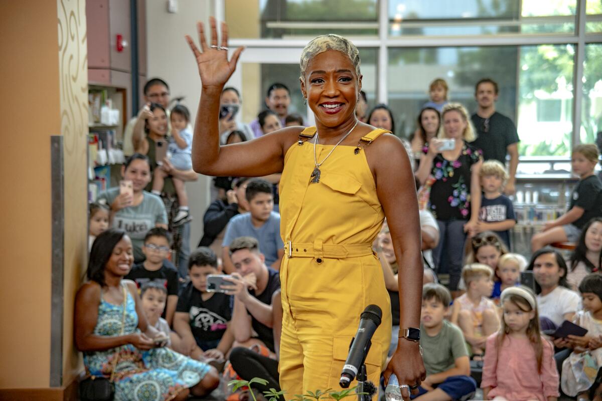 Tiffany Haddish arrives at the Tustin Library and greets her fans.