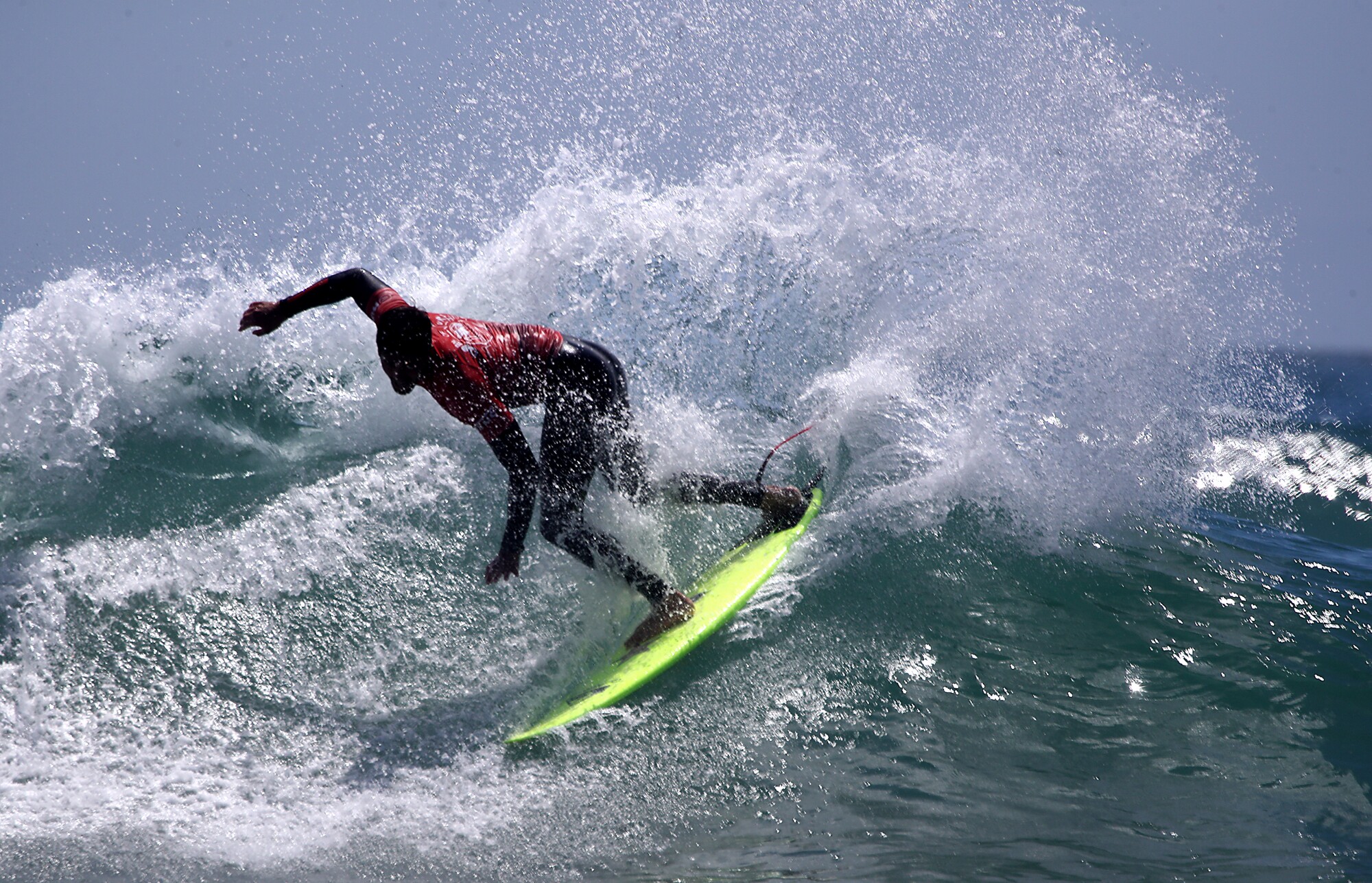 Ezekiel Lau competes in the finals of the US Open of Surfing.