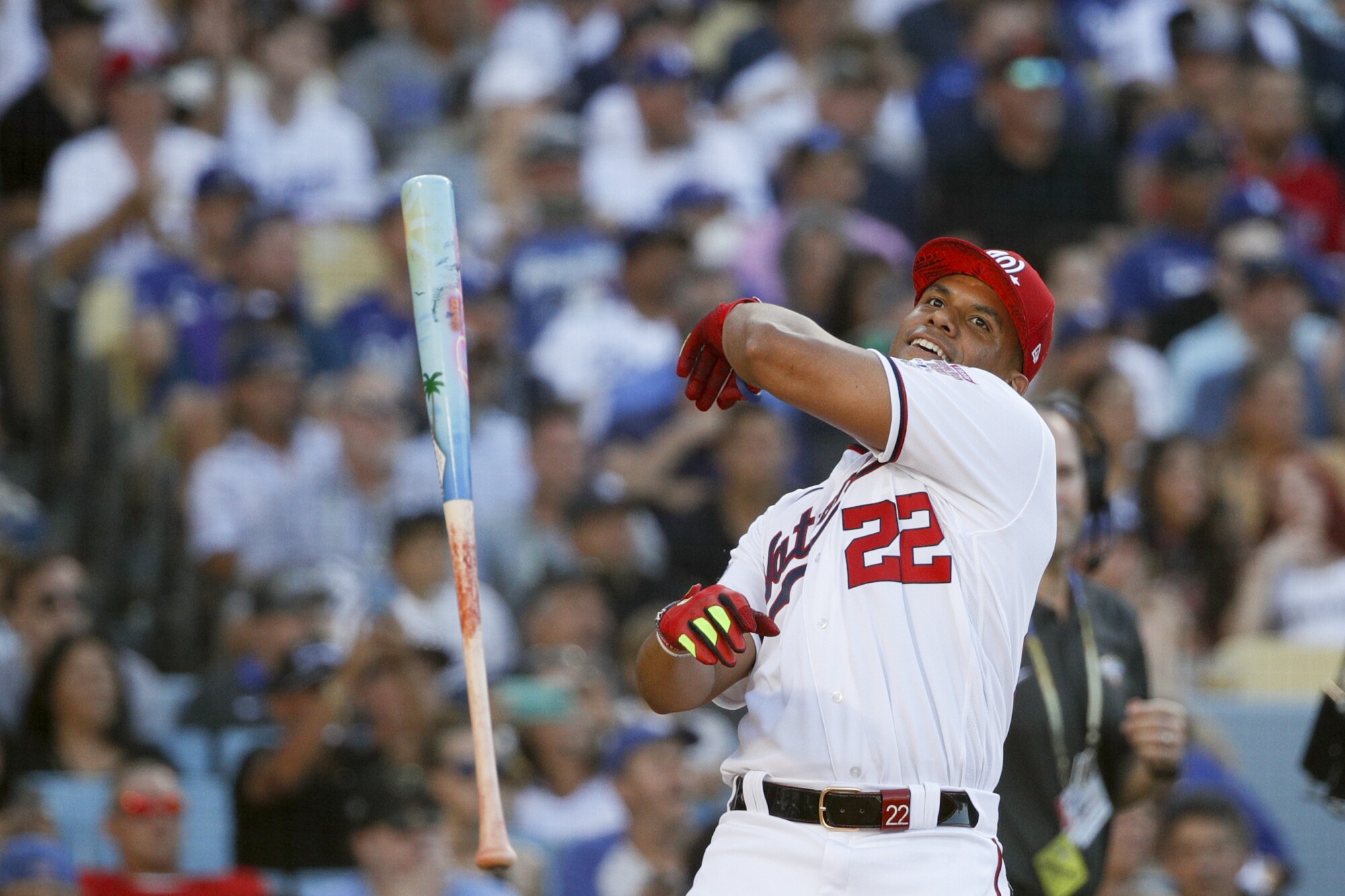 Washington Nationals' Juan Soto tosses his bat after defeating Cleveland Guardians' José Ramírez.