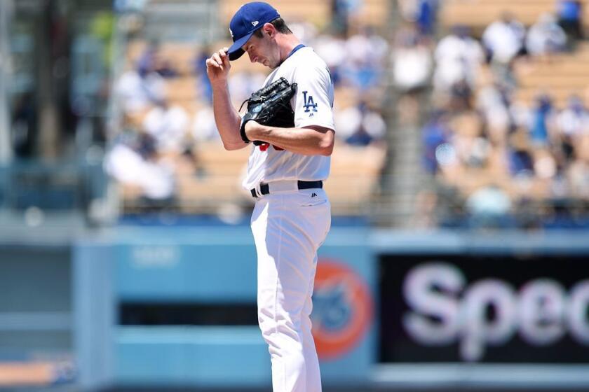 LOS ANGELES, CA - JUNE 25: Pitcher Brandon McCarthy #38 of the Los Angeles Dodgers reacts after a wild pitch against Colorado Rockies during the second inning of the baseball game at Dodger Stadium June 25, 2017, in Los Angeles, California. (Photo by Kevork Djansezian/Getty Images) ** OUTS - ELSENT, FPG, CM - OUTS * NM, PH, VA if sourced by CT, LA or MoD **