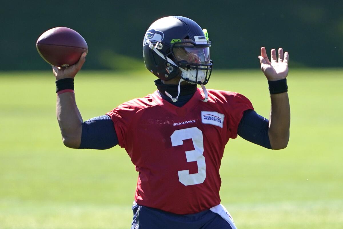 Seattle Seahawks quarterback Russell Wilson passes during a practice session on Sept. 1.