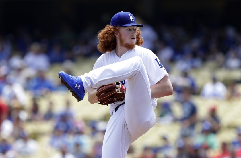 Dustin May delivers during his second big league start, against the St. Louis Cardinals on August 7.