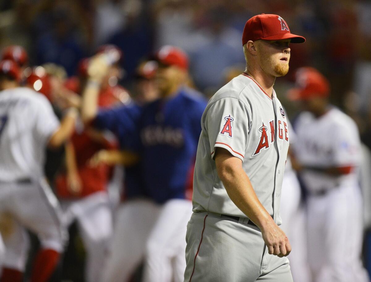 Angels lose to Texas Rangers, 14-11, on walk-off home run in 10th