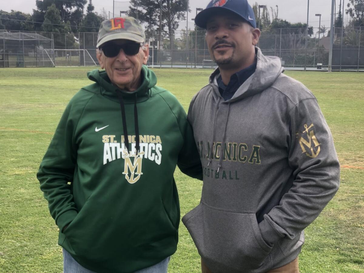 Ron Price poses for a photo with Geoff McArthur.