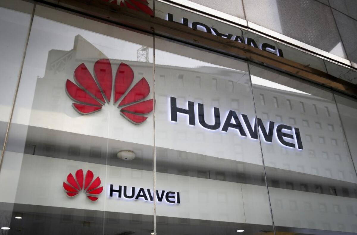 Huawei logo on a building.