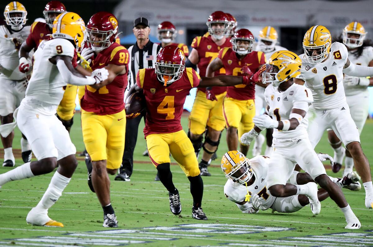USC wide receiver Mario Williams runs after a catch against the Arizona State defense in the first quarter Saturday.