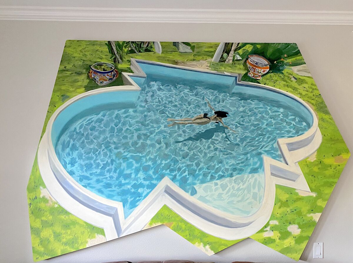 A shaped-canvas swimming pool. (7x5 feet)