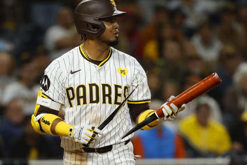San Diego CA - May 14: San Diego Padres' Luis Arraez holds a broken bat in the ninth inning against the Colorado Rockies at Petco Park on Tuesday, May 14, 2024 in San Diego, CA. (K.C. Alfred / The San Diego Union-Tribune)