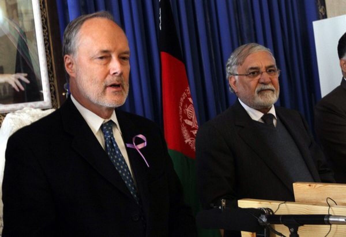 U.S. Ambassador to Afghanistan James Blair Cunningham, left, and the governor of Herat province, Sayed Fazlullah Wahidi, at a joint news conference in Herat, Afghanistan, on Wednesday.
