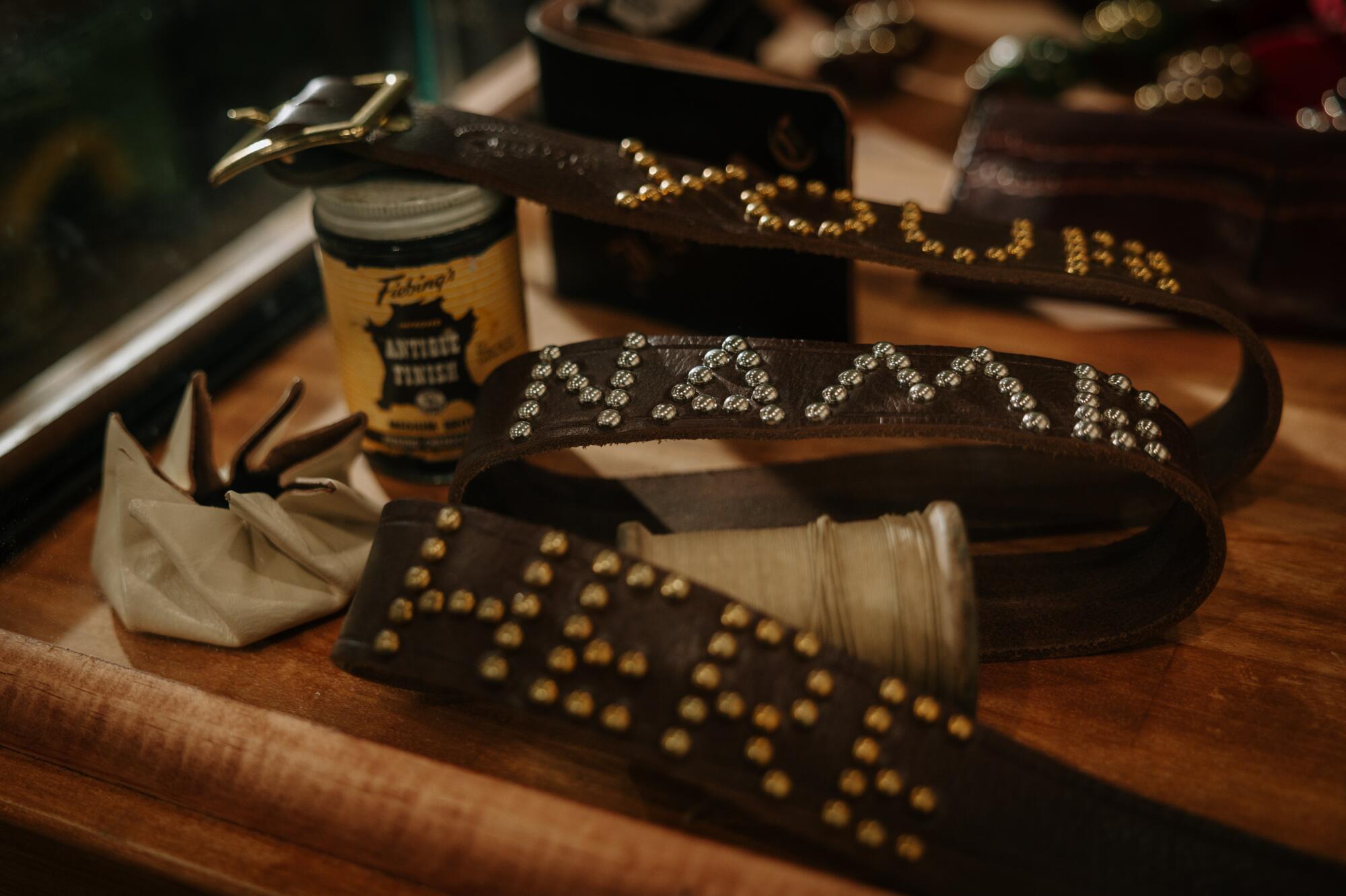 Los Angeles, CA - July 28: Custom belts at Guillermo Cuevas' Dunrite Leatherworks.