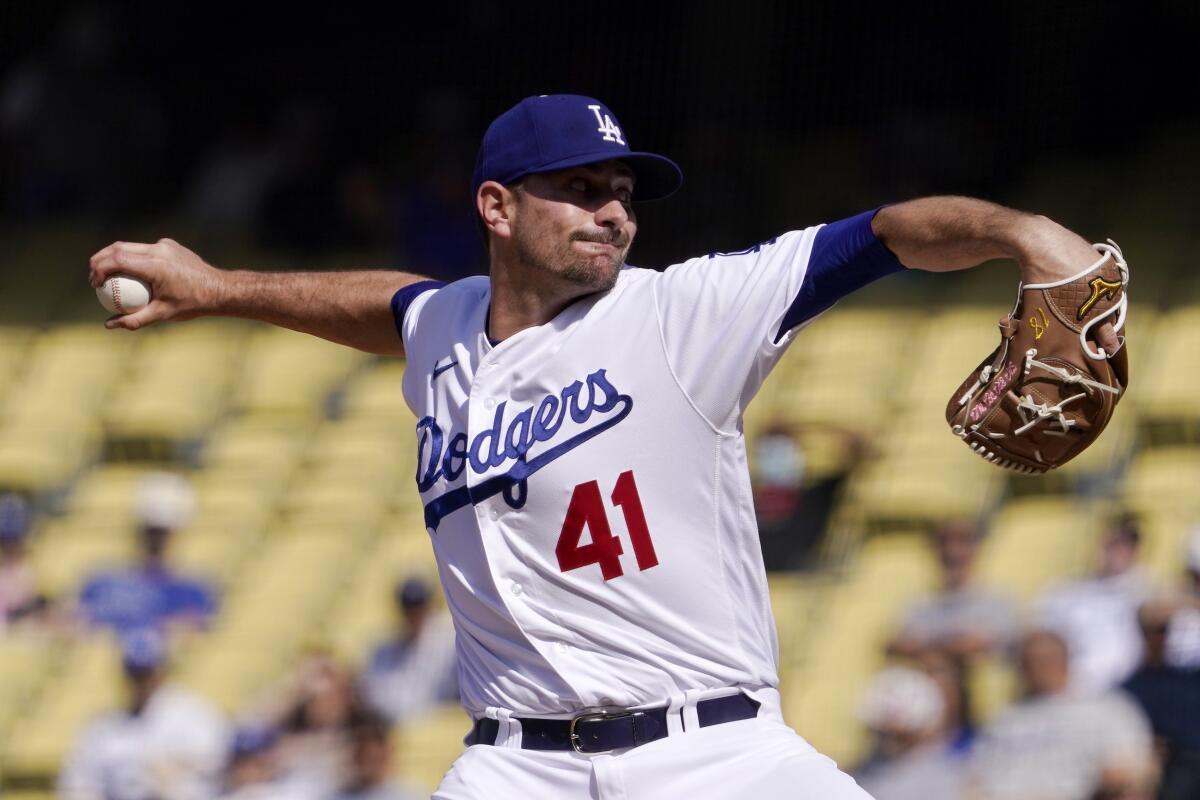 Los Angeles Dodgers relief pitcher Daniel Hudson throws to the plate during the ninth inning.