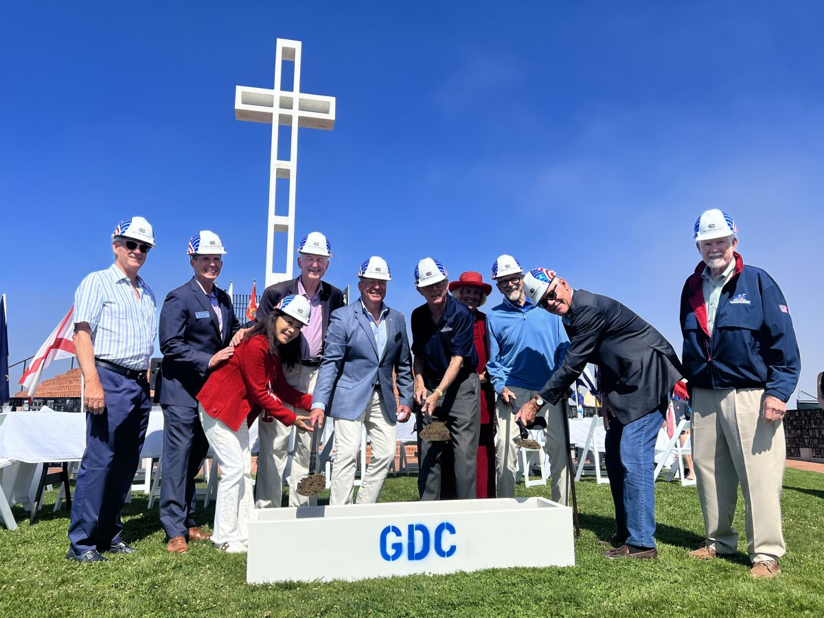 Mount Soledad Memorial Association members, donors and others put spades in the ground for Phase III of the memorial.