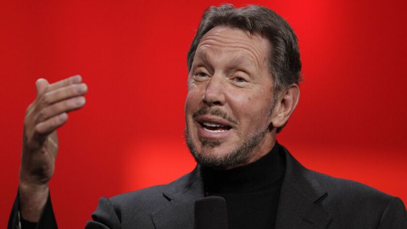 Oracle CEO Larry Ellison, at Oracle OpenWorld in San Francisco in 2012, is now on the Tesla board.
