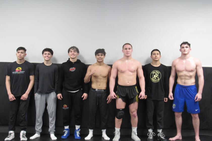 Fountain Valley's Christian Stoeber, Hunter Jauregui, Nathan Marquez, Hercules Windrath, Ryland Whitworth, Anthony Lucio and Khale McDonnell, from left, have advanced to the CIF State individual wrestling championships.