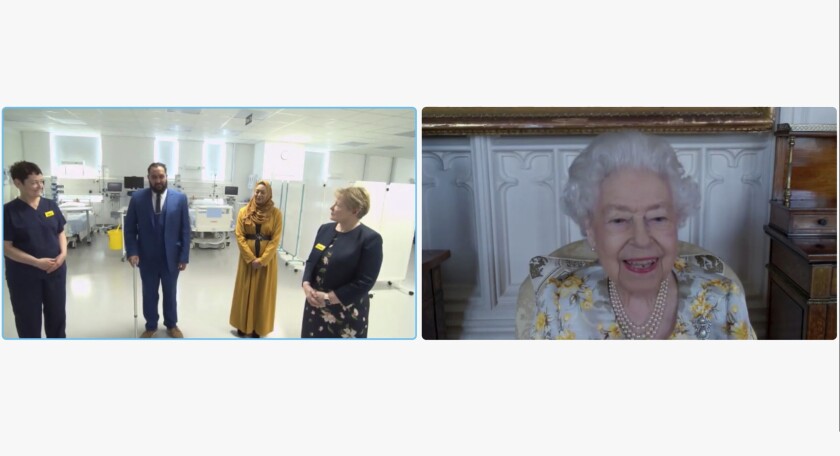 In this image from video issued by Buckingham Palace on Sunday, April 10, 2022, Britain's Queen Elizabeth II speaks to Dr. Marie Healey, divisional director for surgery and critical care; Mr. Asef and Mrs. Shamina Hussain and Jackie Sullivan during a video link call and virtual visit to the Royal London Hospital on Wednesday April 6, 2022, to mark the official opening of the hospital's Queen Elizabeth Unit. (Buckingham Palace via AP)