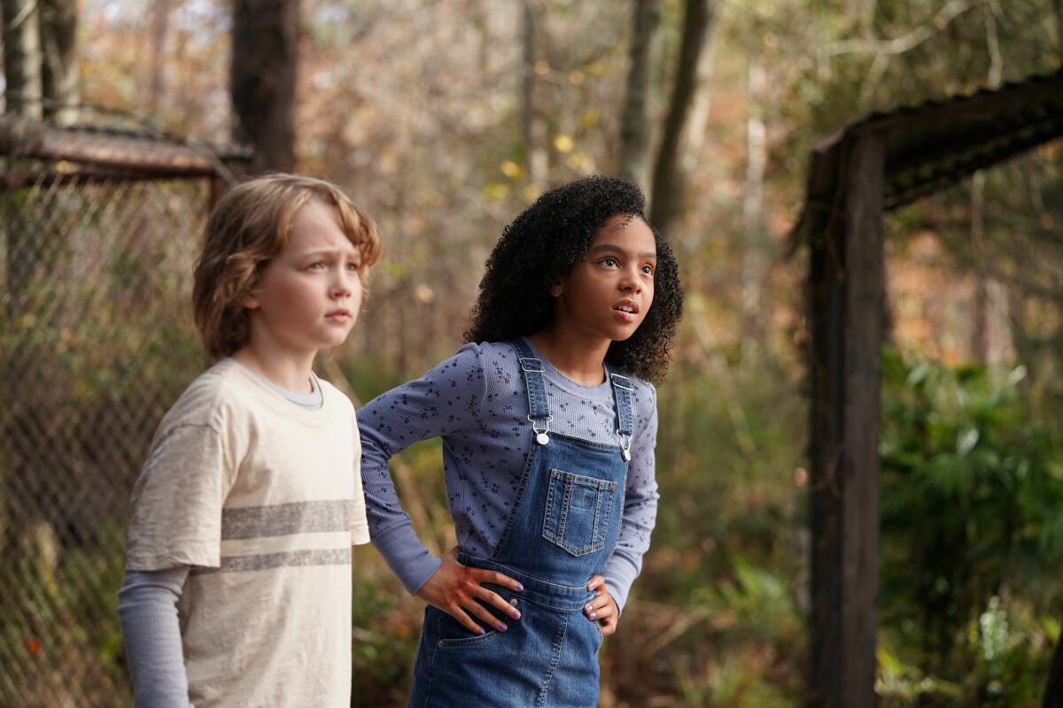 A boy and a girl in the movie “The Tiger Rising”