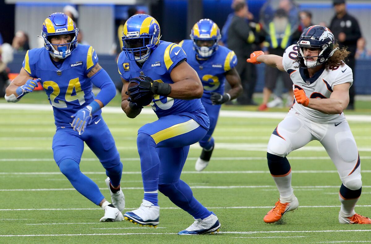 Rams linebacker Bobby Wagner intercepts a pass thrown by the Broncos' Russell Wilson in December.