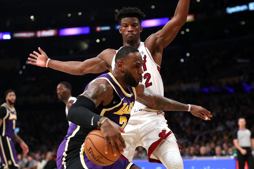 LOS ANGELES, CALIFORNIA - NOVEMBER 08: Jimmy Butler #22 of the Miami Heat defends against LeBron James #23 of the Los Angeles Lakers during the second half of a game at Staples Center on November 08, 2019 in Los Angeles, California. NOTE TO USER: User expressly acknowledges and agrees that, by downloading and/or using this photograph, user is consenting to the terms and conditions of the Getty Images License Agreement (Photo by Sean M. Haffey/Getty Images)