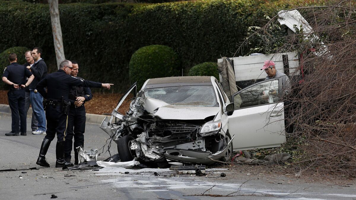 At least 36 people died over the New Year's holiday in the state this year, the California Highway Patrol said. Pictured above, officers examine the damage of a wreck in Beverly Hills in 2016.