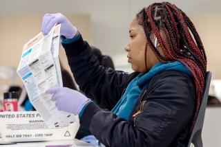 Tiana Harris works at new ballot processing center in City of Industry, CA. 