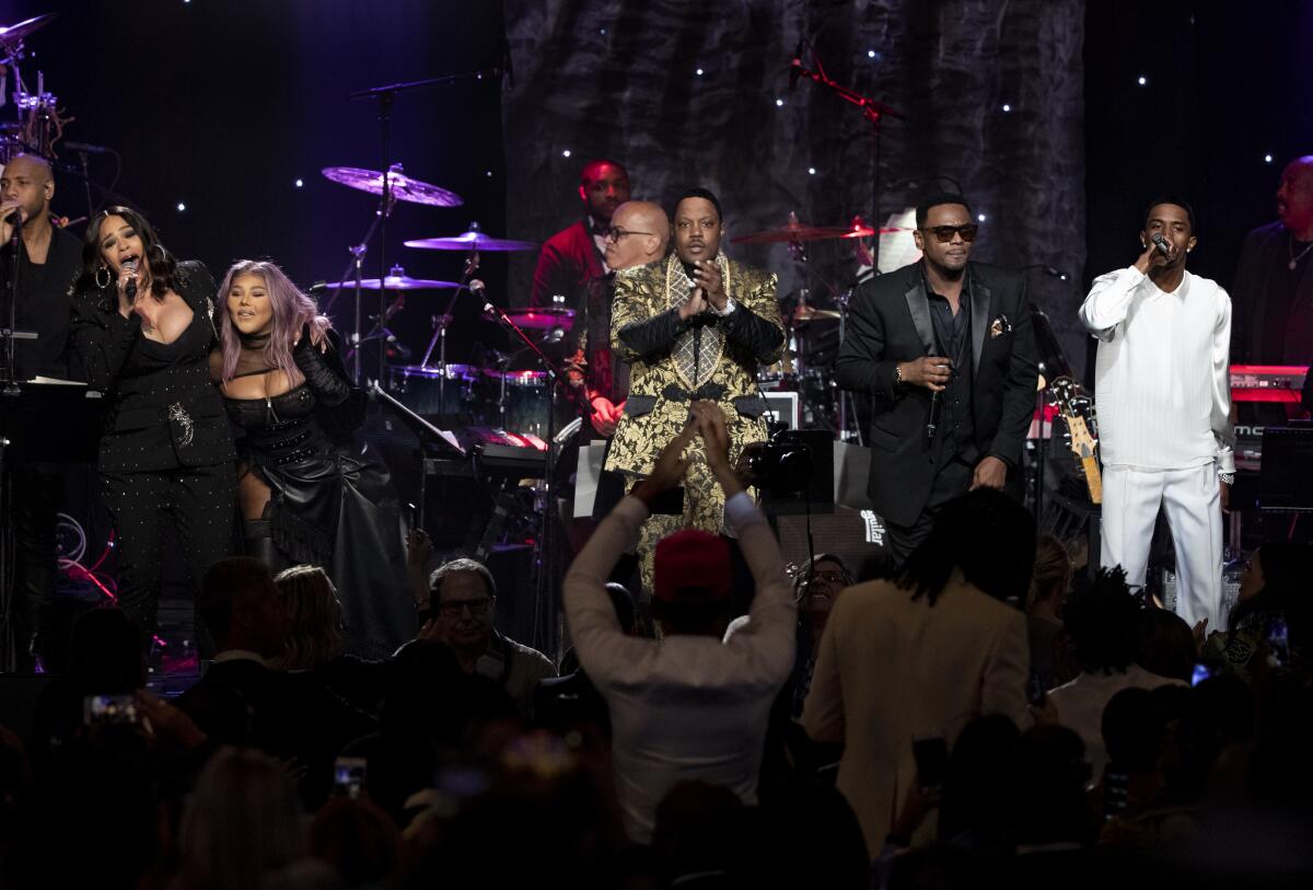 Faith Evans, from left, Lil' Kim, Mase, Carl Thomas and Christian "King" Combs perform during a tribute to Sean "Diddy" Combs.