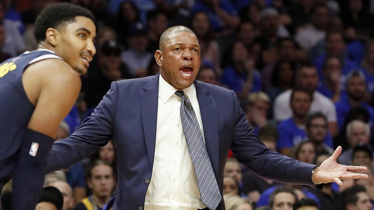 Clippers coach Doc Rivers complains to the officials about a call in the fourth quarter.