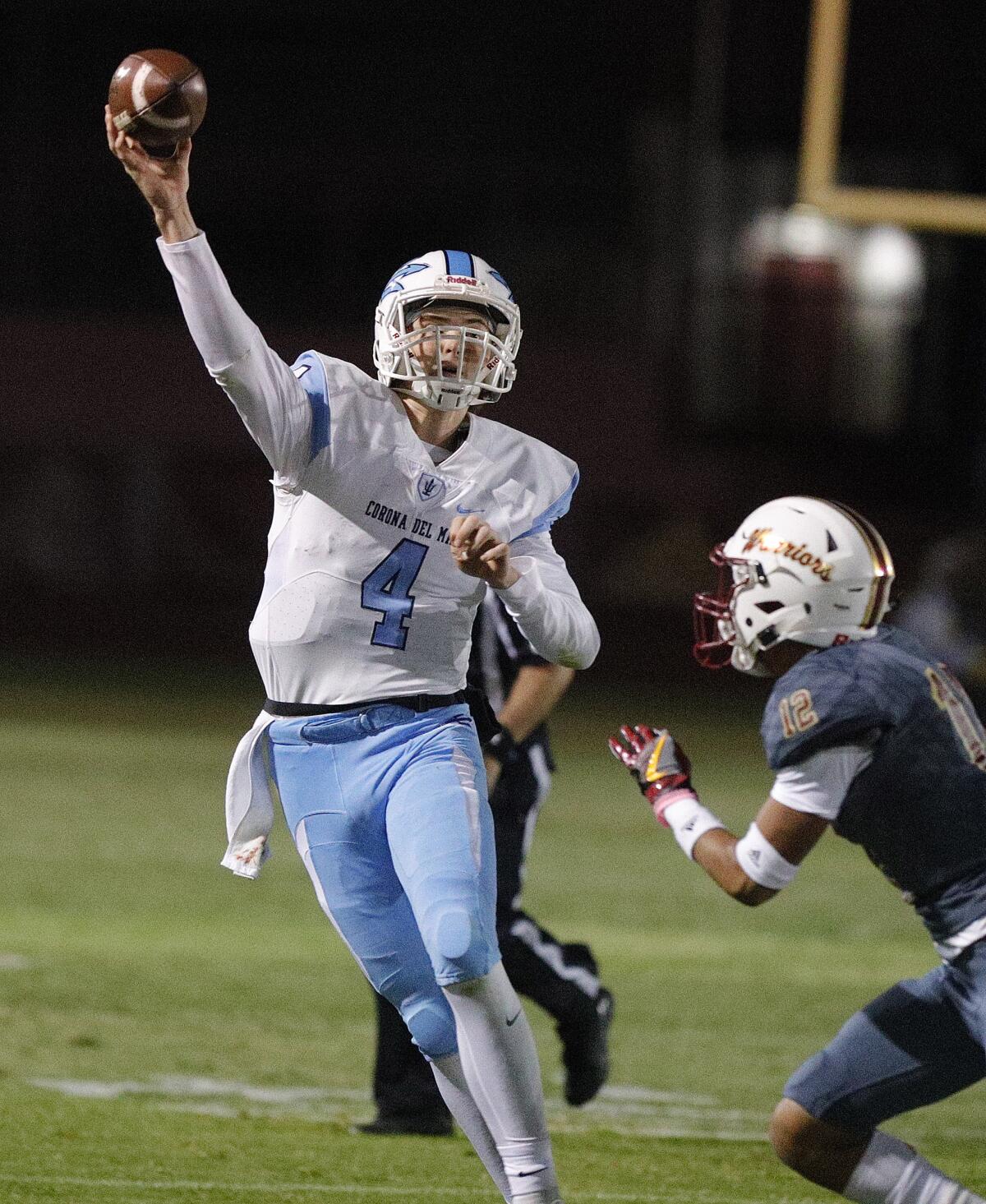 Corona del Mar's Ethan Garbers scrambles and throws a pass in a CIF Southern Section Division 3 semifinal playoff game at Alemany High in Mission Hills on Nov. 22.