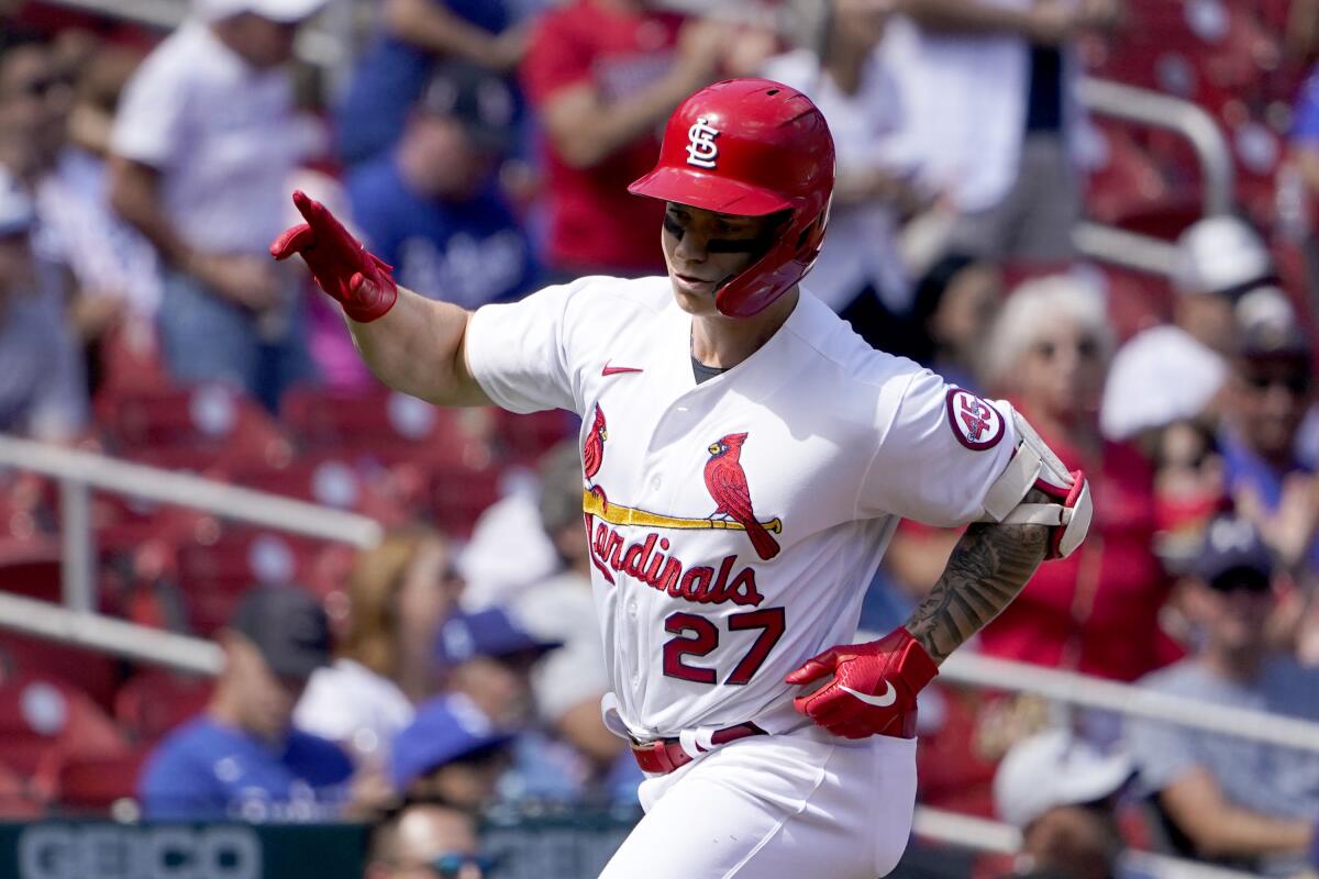 St. Louis Cardinals' Tyler O'Neill celebrates as he rounds the bases after hitting a solo home run during the fifth inning of a baseball game against the Los Angeles Dodgers Thursday, Sept. 9, 2021, in St. Louis. (AP Photo/Jeff Roberson)