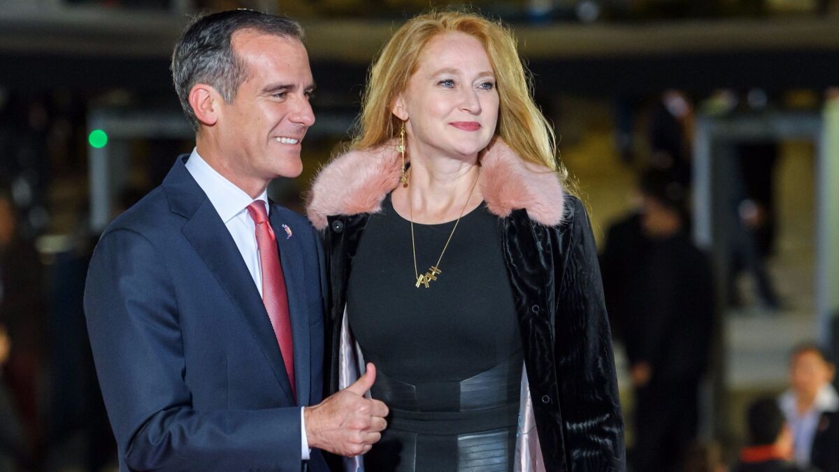 L.A. Mayor Eric Garcetti and his wife, Amy Wakeland, arrive at the opening ceremony of the 131st International Olympic Committee Session in Lima, Peru, on Sept. 12. Some of Garcetti's travel over the last year was tied to the city's successful bid for the 2028 Summer Games.
