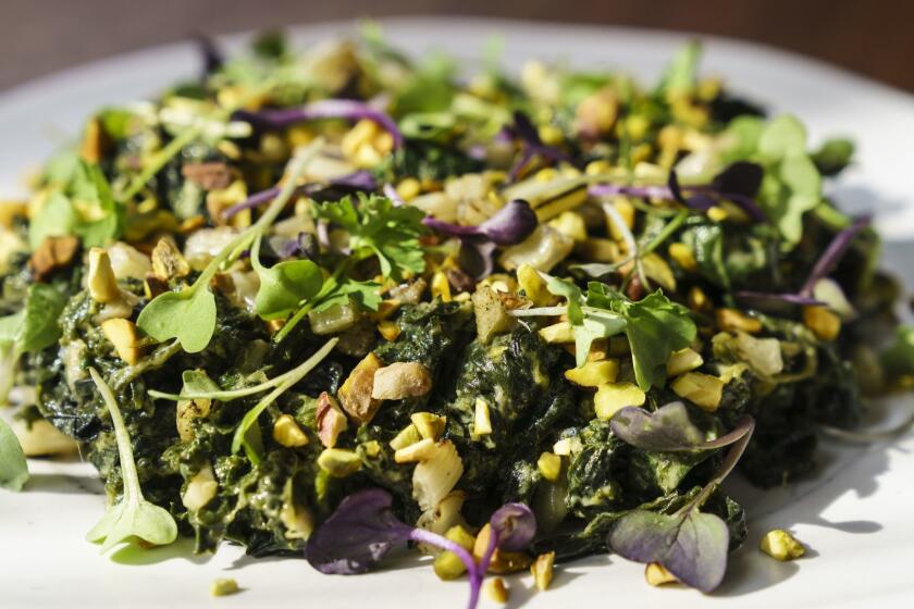 LOS ANGELES, CALIF. -- SATURDAY, MARCH 9, 2019: Ray Anthony Barrett's greens, with kale, chard, avocado, pistachios in Los Angeles, Calif., on March 9, 2019. (Marcus Yam / Los Angeles Times)
