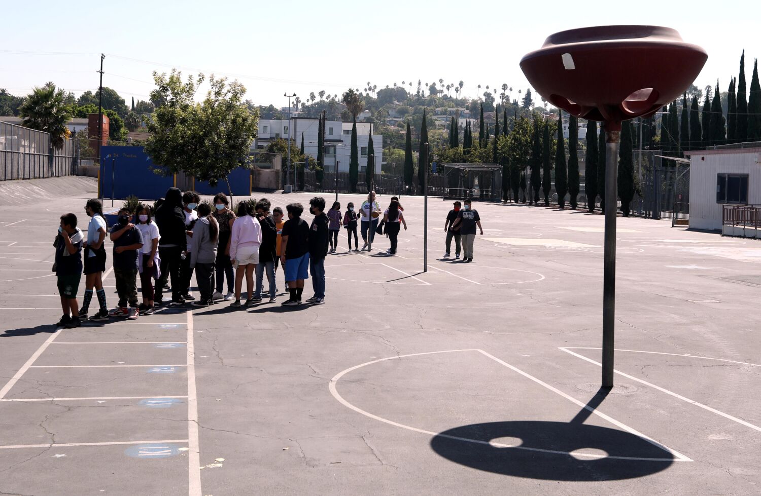Op-Ed: California makes it too hard for schools to shield kids from extreme heat