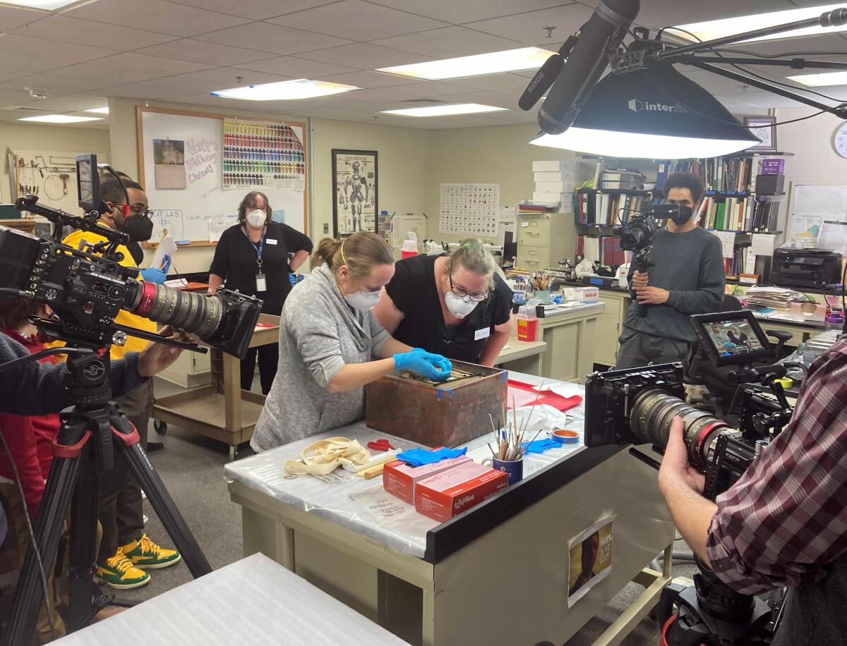 Virginia state conservators work on a box believed to be a time capsule 