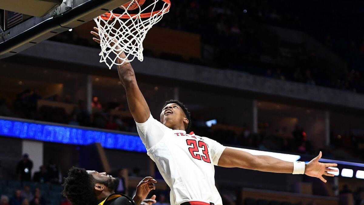 Texas Tech's Jarrett Culver scores over Northern Kentucky's Trevon Faulkner during a first-round game NCAA tournament game March 22 in Tulsa.